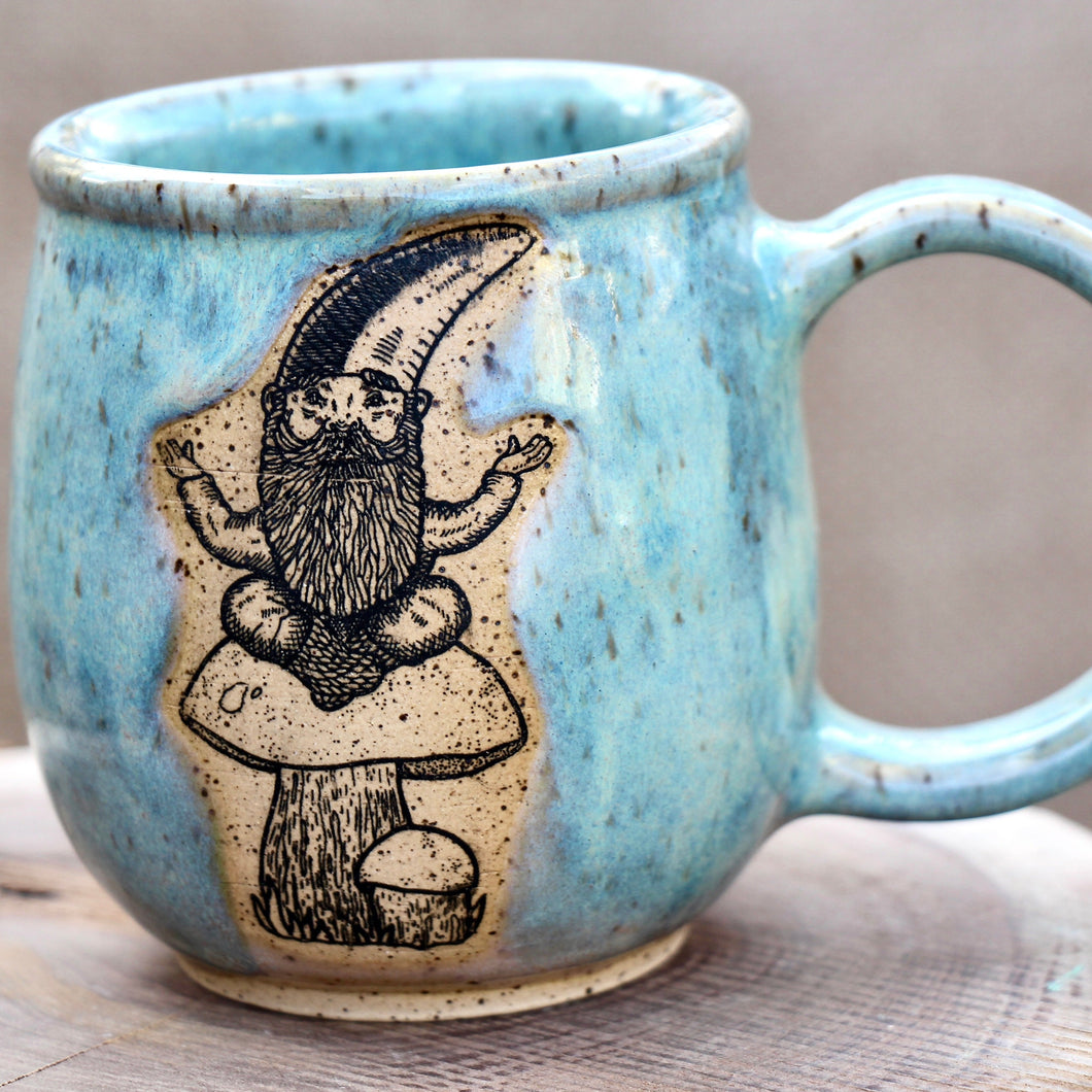 Icy Blue Mug with Gnome Perched on a Mushroom